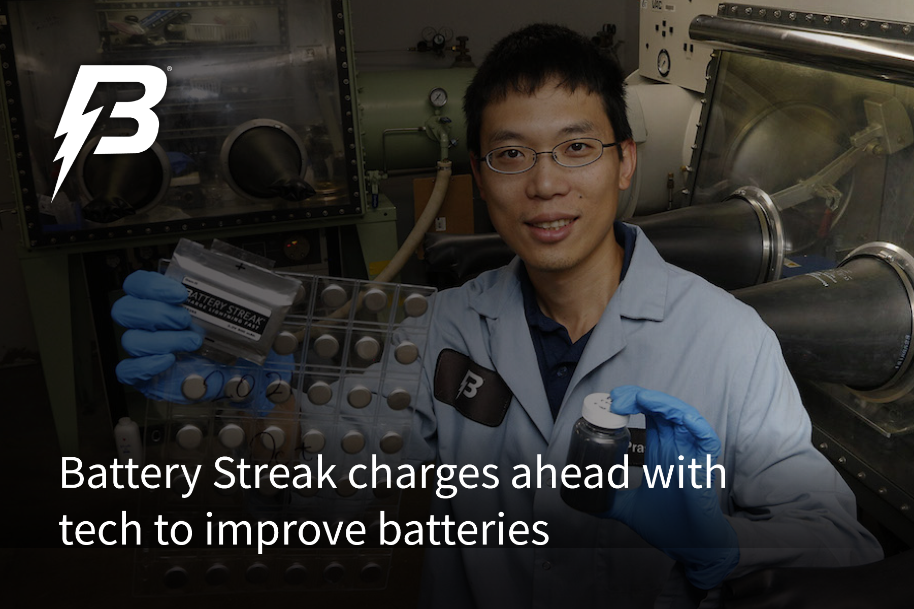 Battery Streak scientist Matt Lai holds a battery pouch and coin cells and a jar of the titanium niobium oxide.